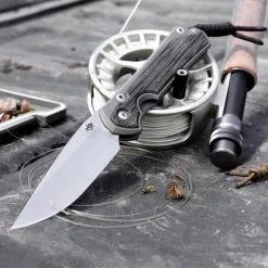 CHRIS REEVE KNIVES Chris Reeves Large Sebenza 31 Black Canvas Micarta 15 CHRIS REEVE KNIVES Chris Reeves Large Sebenza 31 Black Canvas Micarta