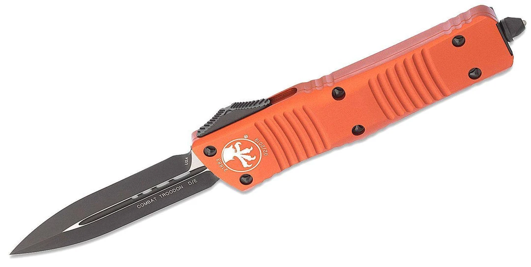 All Knife Brands Microtech 142-1OR Combat Troodon Auto OTF 3.75" Black D/E Orange Handles 3 All Knife Brands Microtech 142-1OR Combat Troodon Auto OTF 3.75" Black D/E Orange Handles
