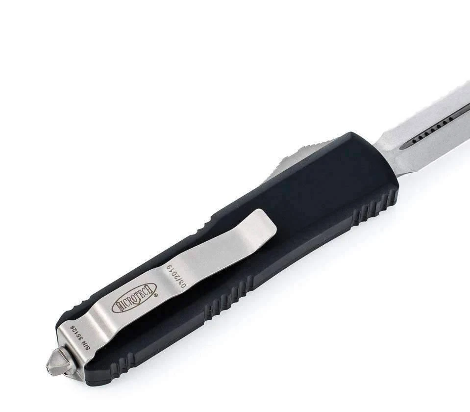 Microtech 232-12 UTX-85 D/E Black Handle Full Serrations Blade 4 Microtech 232-12 UTX-85 D/E Black Handle Full Serrations Blade