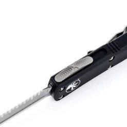 Microtech 232-12 UTX-85 D/E Black Handle Full Serrations Blade 7 Microtech 232-12 UTX-85 D/E Black Handle Full Serrations Blade
